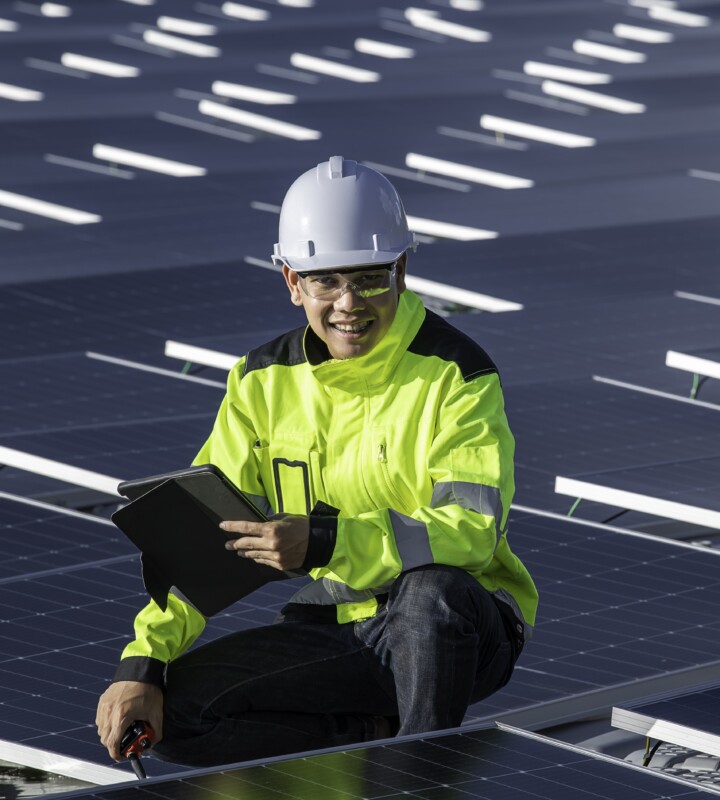 TITLE asian engineer working floating solar power plantrenewable energytechnician investor solar panels checking panels solar energy installation
